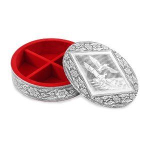 Lined jewelry box with decorative top.